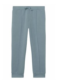 Lyseblå sweatpants med snoreliv, tapered manchetter, folder og sidelommer. Fremstillet af blødt, tekstureret stof.