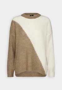 Neulepusero, jossa on diagonaalinen halkio vaaleassa beige- ja kerma-värissä, pyöreä kaula-aukko ja pitkät hihat. Kankaassa on tekstuuripinta.