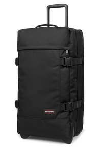Borsa da viaggio nera con ruote, manico estensibile, spallacci regolabili e un'esterno in tessuto resistente. Presenta un'etichetta con logo sul davanti.