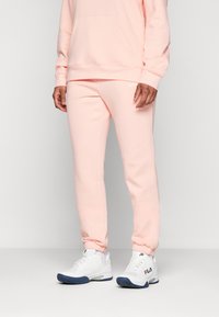 Björn Borg ESSENTIAL PANTS - Treni�ņtērpa apakšdaļas - apricot blush