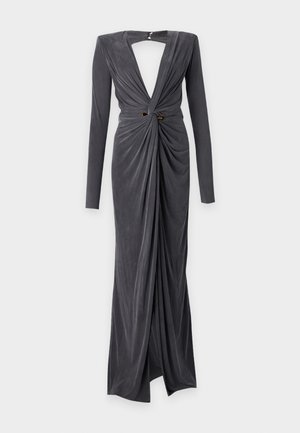 Abito grigio a maniche lunghe con profondo scollo a V, dettaglio anteriore attorcigliato e schiena scoperta. Realizzato in un tessuto morbido con un leggero lucido. Accenti dorati in vita.