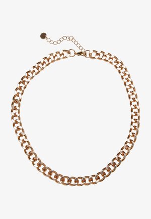 Gold-tone metal chain necklace with interlocking links, adjustable clasp, and a decorative extension chain for length adjustment.
