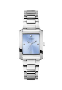 Montre rectangulaire argentée avec un cadran dégradé bleu clair, dotée d'un petit accent en diamant, d'index carrés et d'un bracelet en acier inoxydable.