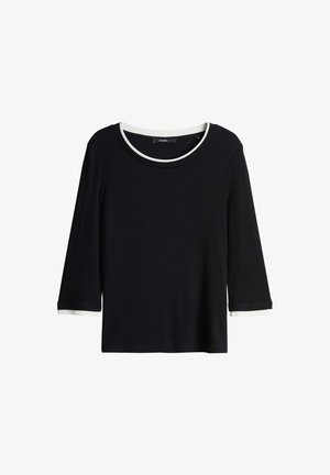 Haut noir à manches longues avec un col rond, présentant des accents côtelés blancs au niveau du col et des poignets. Texture douce, coupe décontractée.