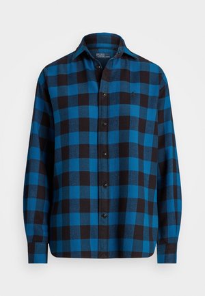 Blauw-zwarte geruite blouse met knopen, lange mouwen, een kraag en het Polo Ralph Lauren-logo geborduurd op de linkerborst.