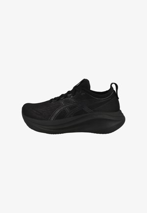 Black athletic shoes with a smooth mesh upper, rounded toe, and thick cushioned sole. Features black laces and subtle logo detailing.