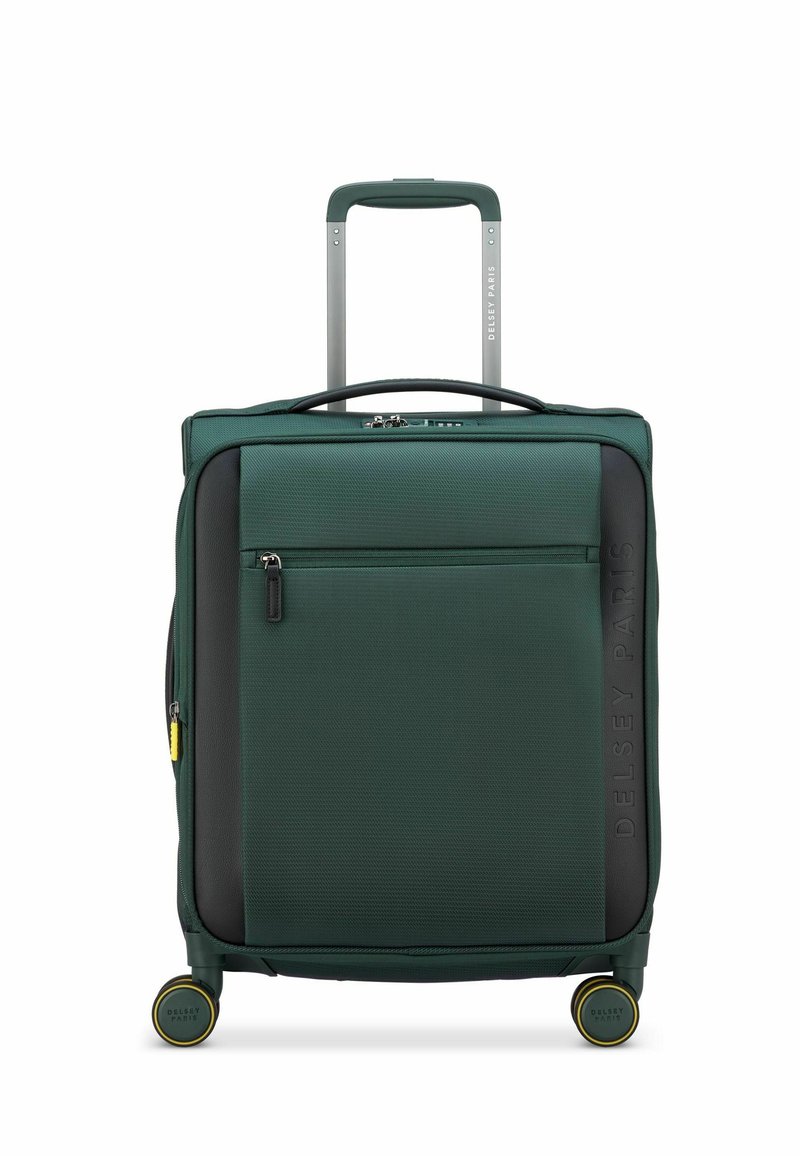 Groene stoffen koffer met een gestructureerd oppervlak, zwarte accenten, een uittrekbare handgreep en wielen met gele punten. Voorzien van een voorste ritszak.