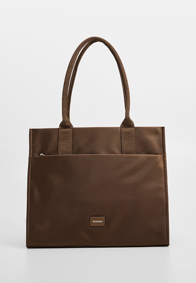 Braune Tragetasche aus strapazierfähigem Stoff mit zwei Griffen, rechteckiger Form und einem kleinen Logo-Patch. Verfügt über eine Reißverschlusstasche an der Seite.