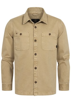 Beige skjorte med knapper laget av teksturert stoff. Har to frontlommer med klaffer, brune knapper og krage.