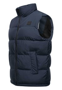 Gilet puffer senza maniche blu navy con colletto alto, zip frontale e tasche laterali, caratterizzato da una texture trapuntata e una toppa con logo.