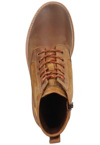 Brown leather ankle boot with tan suede accents, round toe, and round laces. Features a side zipper and logo on the insole.