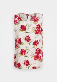 Haut sans manches à motifs floraux crème avec fleurs rouges et blanches. Il présente un col rond et une petite ouverture en forme de goutte à l'arrière.