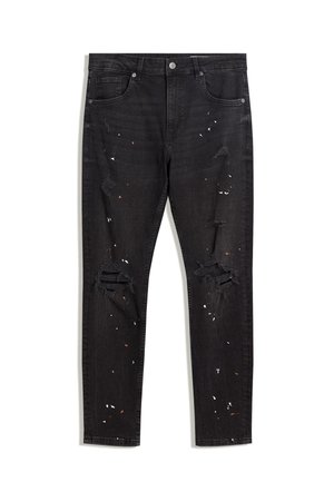 Jean skinny noir délavé avec éclaboussures de peinture et détails déchirés sur les cuisses et les genoux à l'avant, poches avant et fermeture à boutons.