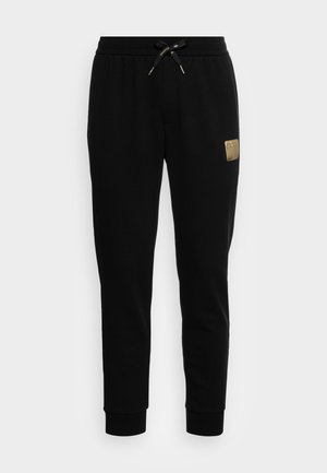 TROUSER - Tracksuit bottoms - black/gold