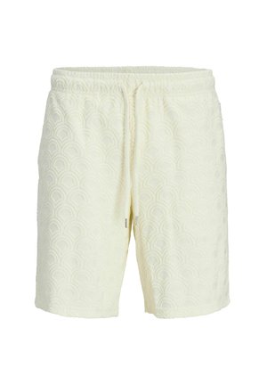 Shorts tissés jaune clair avec un motif de vagues texturé, taille élastique avec cordon de serrage et coupe décontractée. Les shorts arrivent au milieu de la cuisse.