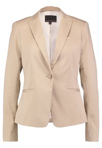 Blazer beige da donna realizzato in tessuto morbido, con chiusura a un bottone, rever a punta e due tasche frontali.