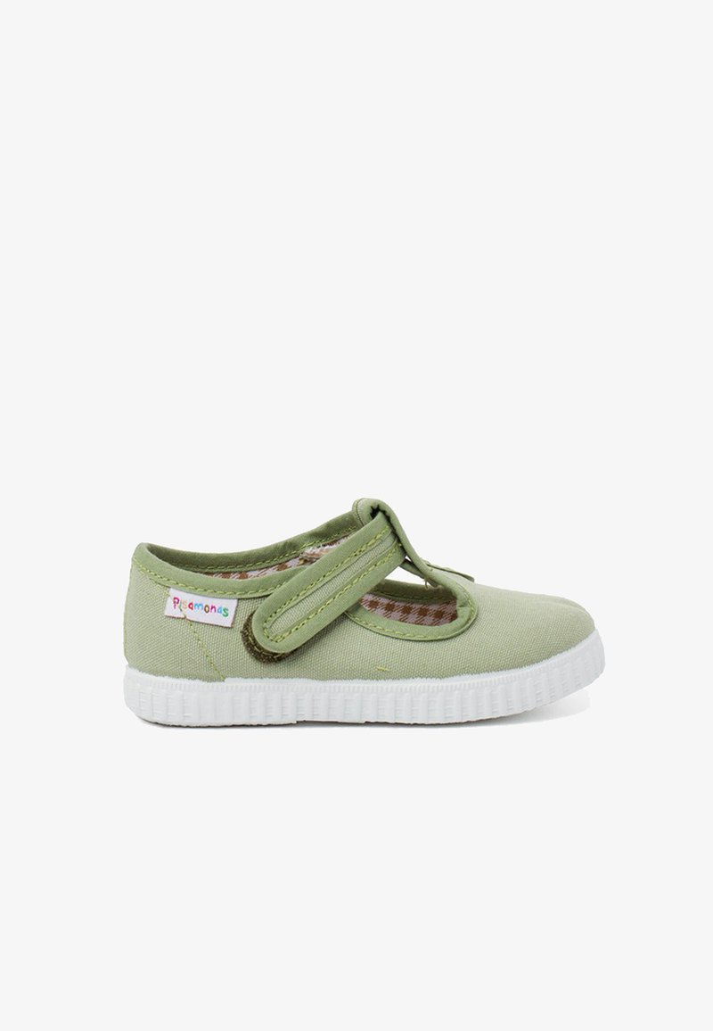 Zielone płócienne buty Mary Jane z białą gumową podeszwą, z bocznym regulowanym paskiem i wkładką w kratkę. Regulowane dopasowanie.