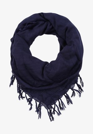 Ciemnoniebieski szalik z miękkiej tkaniny, luźno owinięty w okrągły kształt, z frędzlami na brzegach.