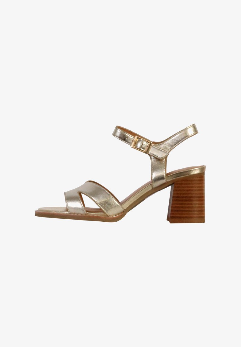 Gold metallic strappy sandal with a block heel, featuring three upper bands and an adjustable ankle strap. Smooth texture with wooden heel.
