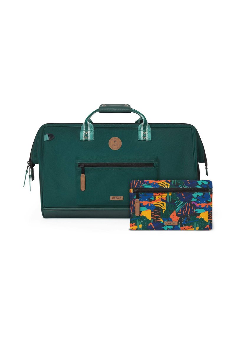 Sac de voyage vert foncé avec poche avant zippée et poignée, accompagné d'une pochette plus petite à motifs colorés avec une fermeture éclair frontale.