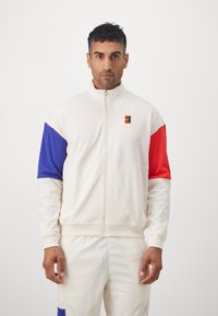 Nike Performance - HERITAGE SUIT - Športna jakna/jopica - pale ivory deep night light crimson Miniaturna slika 1