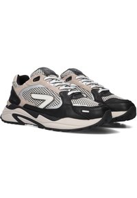 Airy black and beige sneakers with mesh and leather materials, featuring a rounded toe, white laces, and textured accents on the sides.