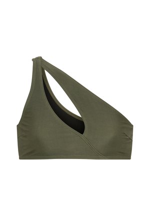 Olivgrüner BH mit einzigartigem asymmetrischem Design, mit einem Träger und einem seitlichen Ausschnitt. Glatte Textur und dezente Nähte.