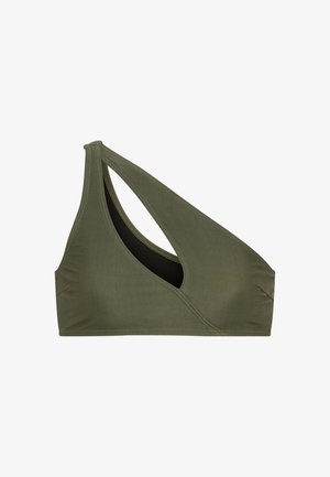 Olivgrüner BH mit einzigartigem asymmetrischem Design, mit einem Träger und einem seitlichen Ausschnitt. Glatte Textur und dezente Nähte.