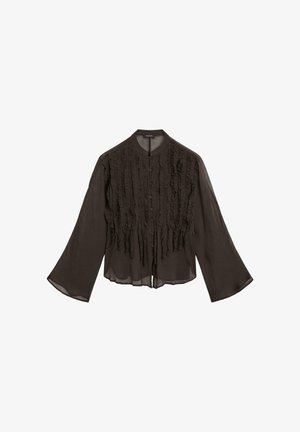 Blouse noire légère avec un devant à volants, des manches longues en cloche et un col arrondi. Fermeture à boutons sur le devant.