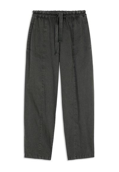 Dark gray, loose-fitting pants with an elastic waistband and drawstring. Features side pockets and vertical seam detailing. Soft texture.