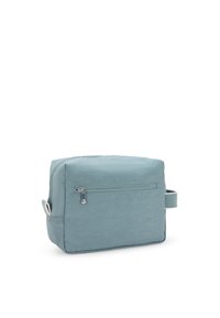 Borsa da toeletta in tessuto blu con forma rettangolare, dotata di una tasca con zip frontale e di una maniglia laterale per il trasporto. Tessuto liscio.