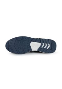 Suela de zapato deportivo negro con acabado de goma texturizada, presentando un patrón hexagonal, acento blanco cerca del talón y detalle de marca.