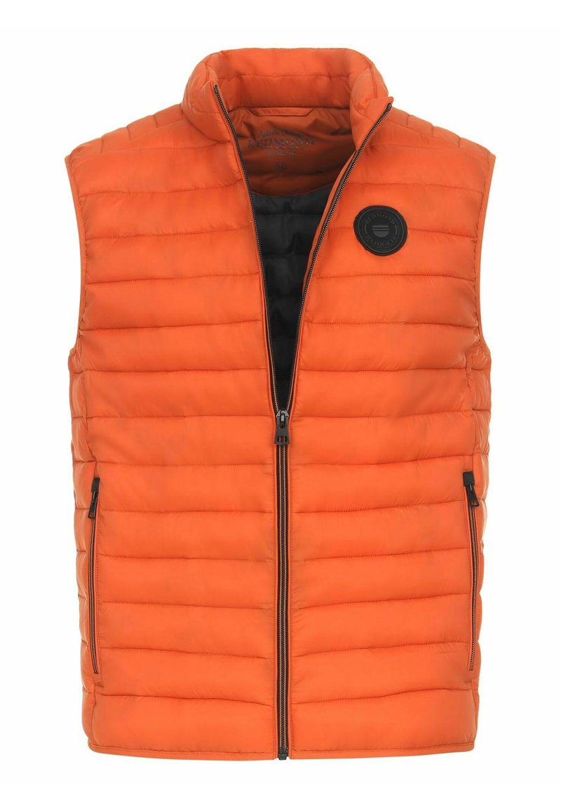 Oranje puffer vest met een hoge kraag, voorkant met rits en twee zijzakken. Heeft horizontale stiksel en een ronde logo-accent.