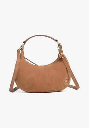 Brown suede hobo bag with a curved shape, adjustable leather strap, brass hardware accents, and a zippered pocket on the side.