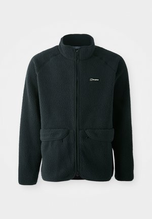 Chaqueta de forro polar negra con un cuello alto, cierre de cremallera en la parte delantera, dos bolsillos frontales y logotipo bordado en el lado izquierdo del pecho. Tejido texturizado.