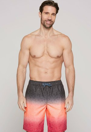 Costumi da bagno da uomo con un design a gradiente, che passa dal nero all'arancione/rosso, caratterizzati da un elastico in vita con cordoncino e un motivo ripetuto con logo "D".