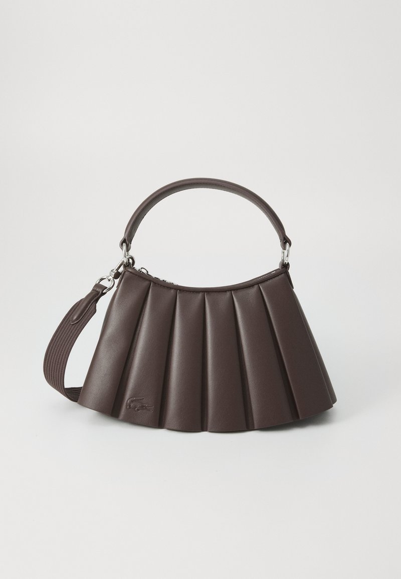 Brown pleated handbag made of leather with a rounded top, short handle, and adjustable strap. Features a subtle logo detail.