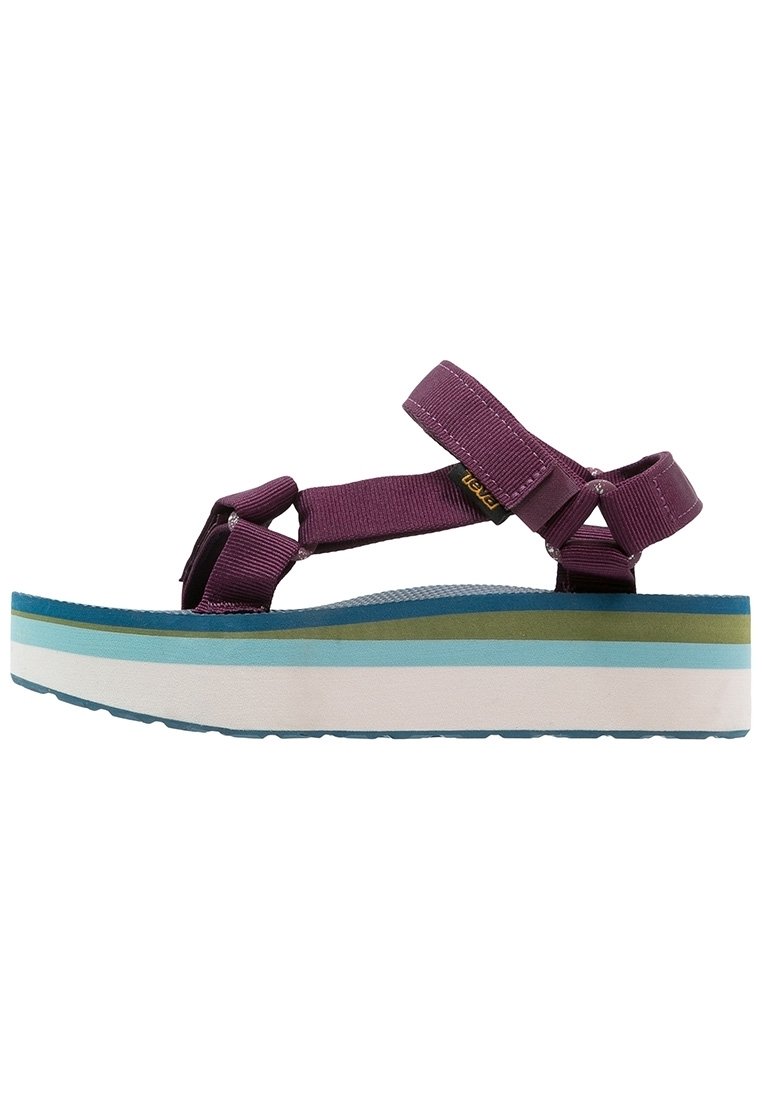 Sandalo platform viola con cinturini in tessuto regolabili e suola multicolore con strisce bianche, azzurro chiaro, verde e blu scuro.