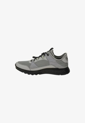 Gray athletic shoe featuring a textured upper with mesh accents, round laces, and a black rubber sole designed for support and traction.