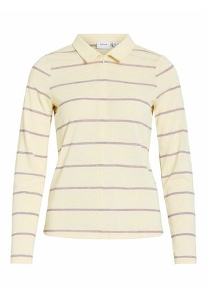 Polo à manches longues jaune clair avec de fines rayures horizontales rouges et noires et une fermeture éclair frontale.