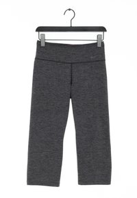 Černé sportovní kalhoty s plochým pasem, vyrobené z texturované látky, s malým logem a rovnými nohavicemi.