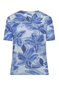 Short-sleeve blue floral top featuring large leaves and intricate swirls, textured fabric with a light blue background. Crew neckline.