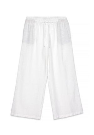 White linen pants with a relaxed fit, featuring an elastic waistband and drawstring, and wide legs for comfort. No visible patterns.