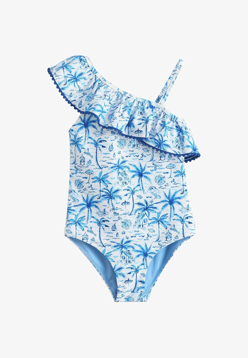Maillot de bain asymétrique bleu et blanc avec imprimé tropical de palmiers et plage, doté d'un décolleté volanté bordé de pompons.