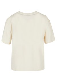 Cream short-sleeved T-shirt made from cotton, with a relaxed fit and a round neckline. Features a plain design without patterns or accents.