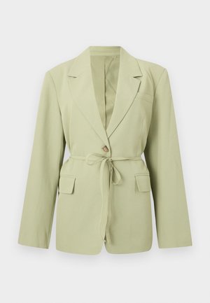 Lysegrønn skreddersydd blazer med lange ermer, hakkede slag, knappelukking, stoffbelte i midjen og to frontlommer med klaff.