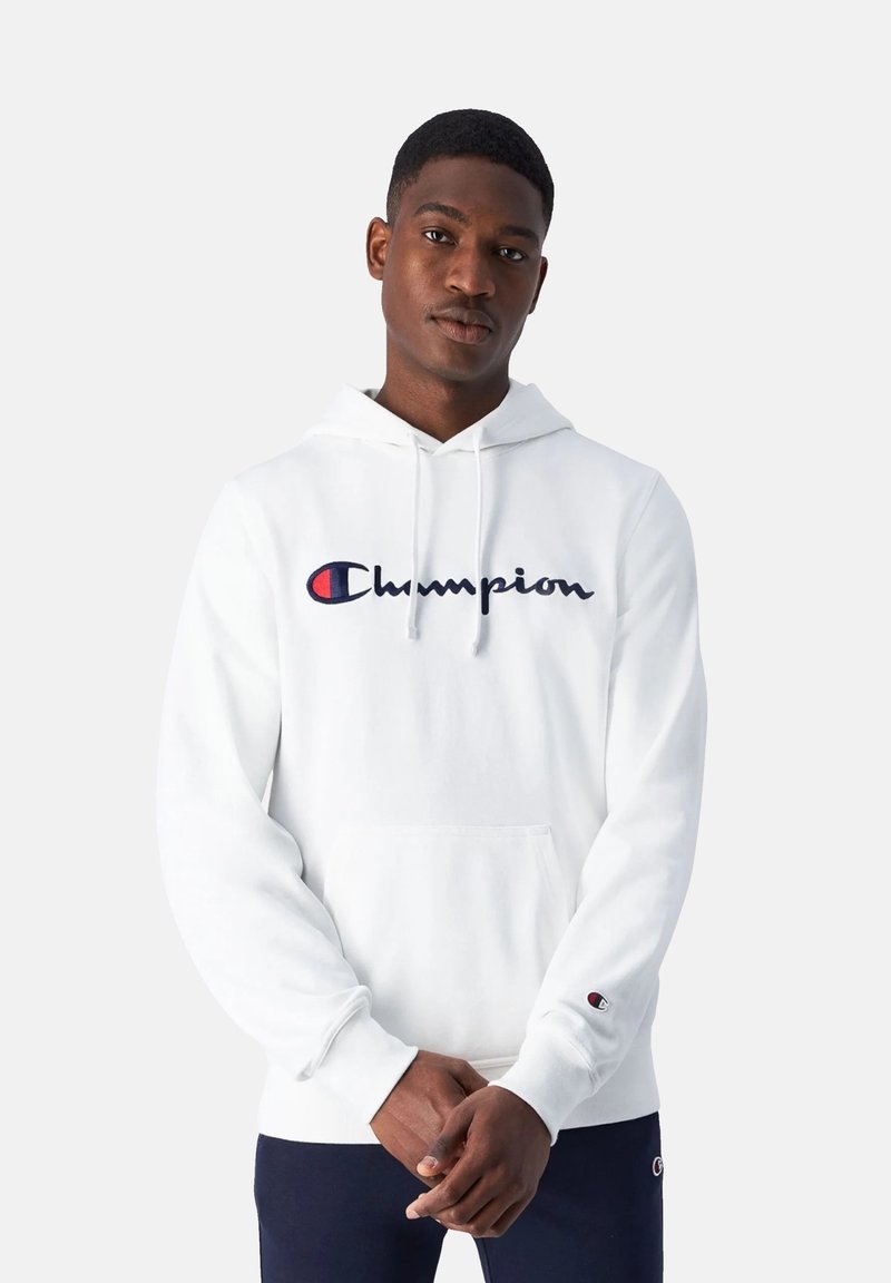 Witte fleecetrui met een voorzak in kangoeroestijl, voorzien van een marineblauw geborduurd "Champion" logo. Ribgebreide manchetten en onderkant.