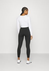 Björn Borg STUDIO SEAMLESS LIGHT - Trikoot - black beauty