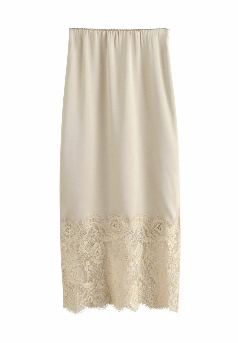 Kremowa spódnica do kolan z elastycznym pasem, ozdobiona delikatną koronką u dołu z motywem kwiatowym. Gładka faktura na całej powierzchni.