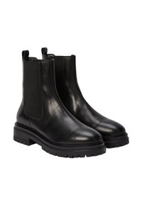 Bottes Chelsea en cuir noir avec des panneaux élastiques sur les côtés, bout arrondi, semelle épaisse et languettes pour un enfilage facile. Texture lisse et design élégant.